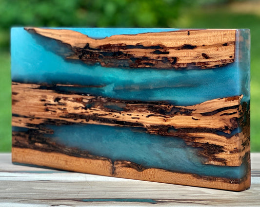 Rotted Cherry Wood and Translucent Blue Epoxy Cutting Board