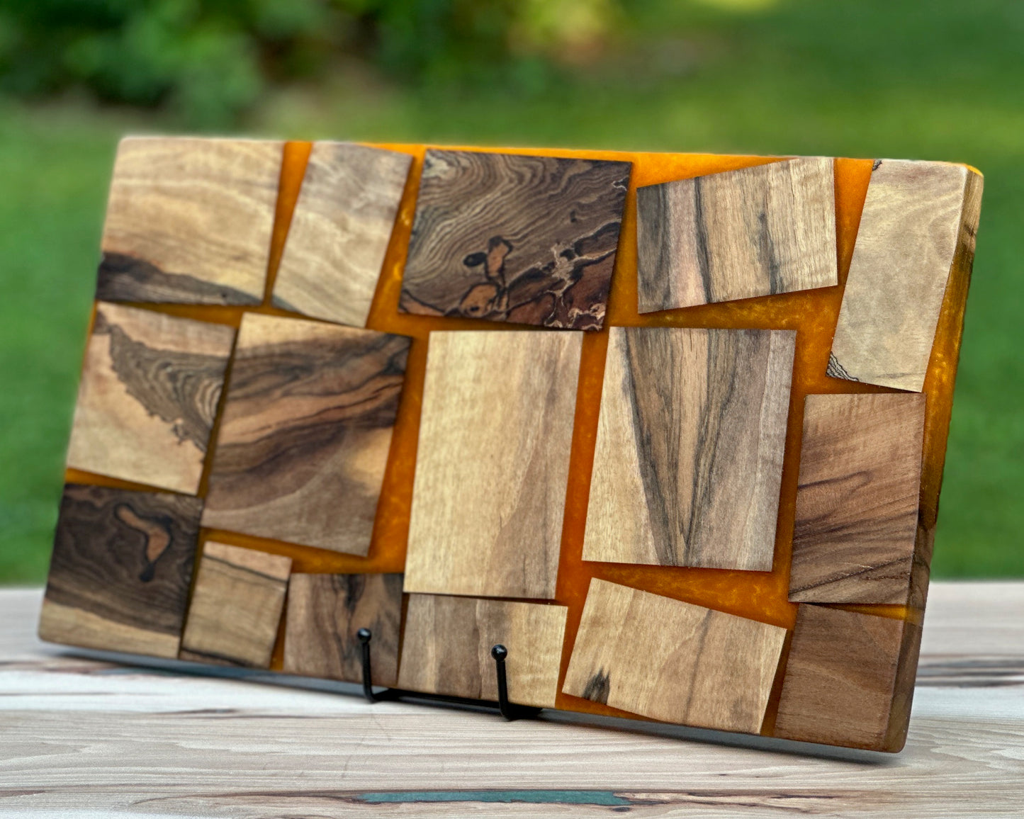 Black Walnut Wood pieces & Orange Epoxy Cutting Board