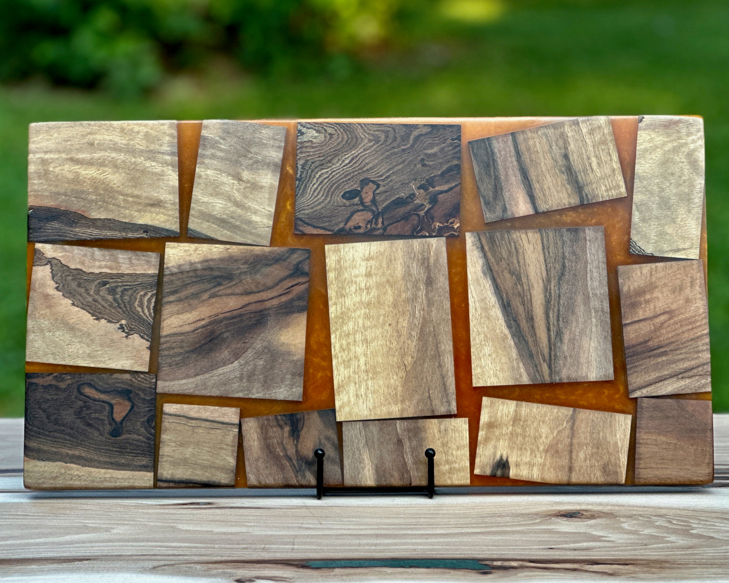 Black Walnut Wood pieces & Orange Epoxy Cutting Board