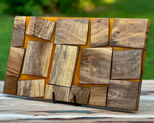 Black Walnut Wood pieces & Orange Epoxy Cutting Board